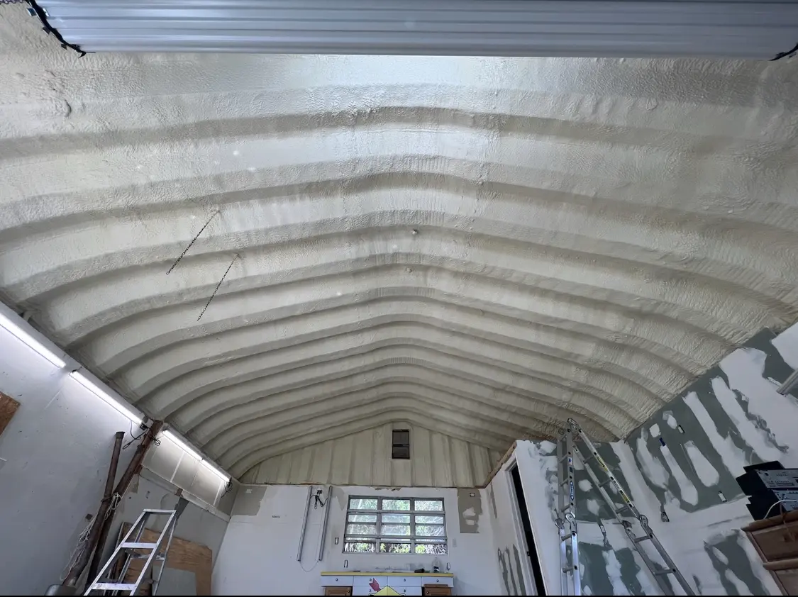 Spray polyurethane foam applied to the underside of a metal roof deck in Marlton